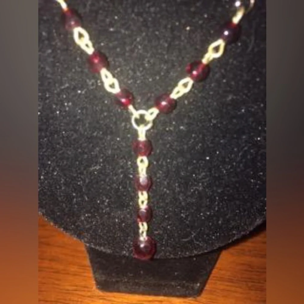 Red and golden beaded necklace.